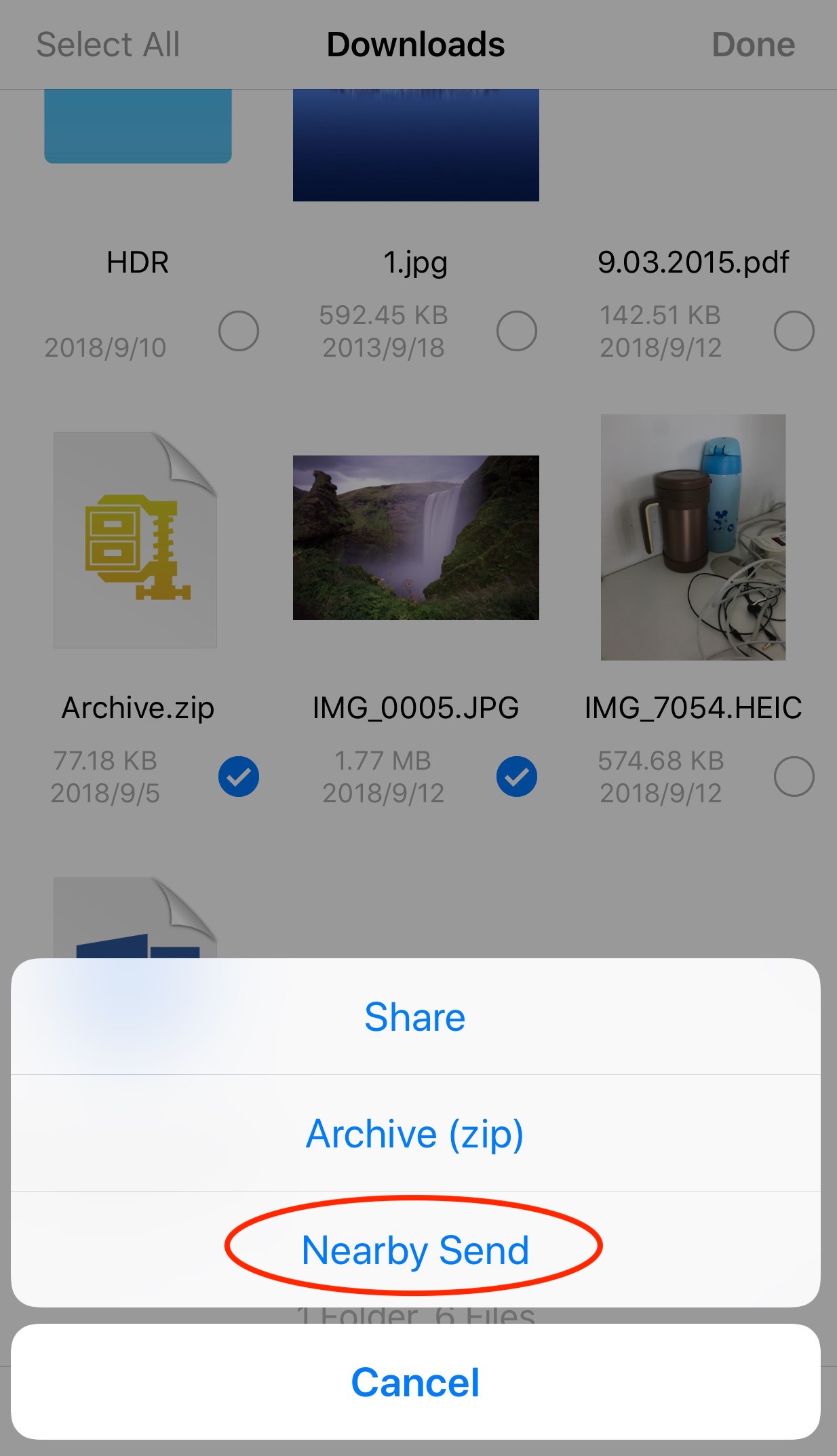 Sending selected files to a nearby device